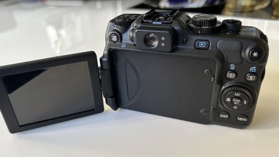 Фотоапарат Canon G12