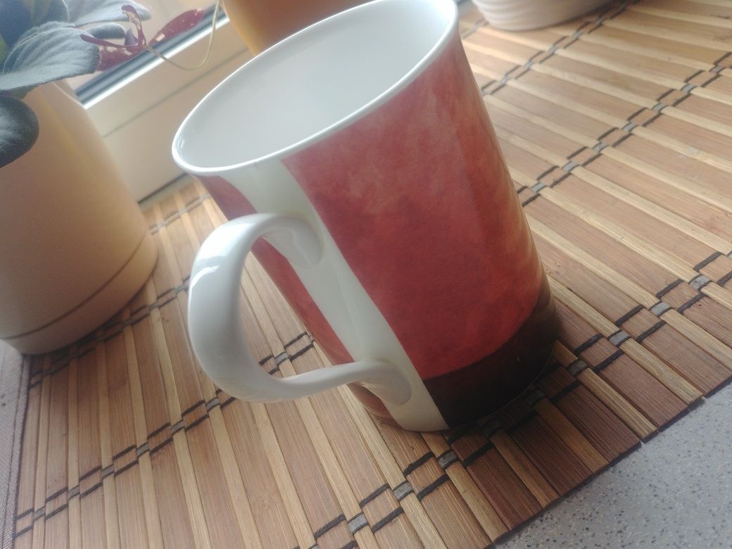Kubek z kotkiem .
