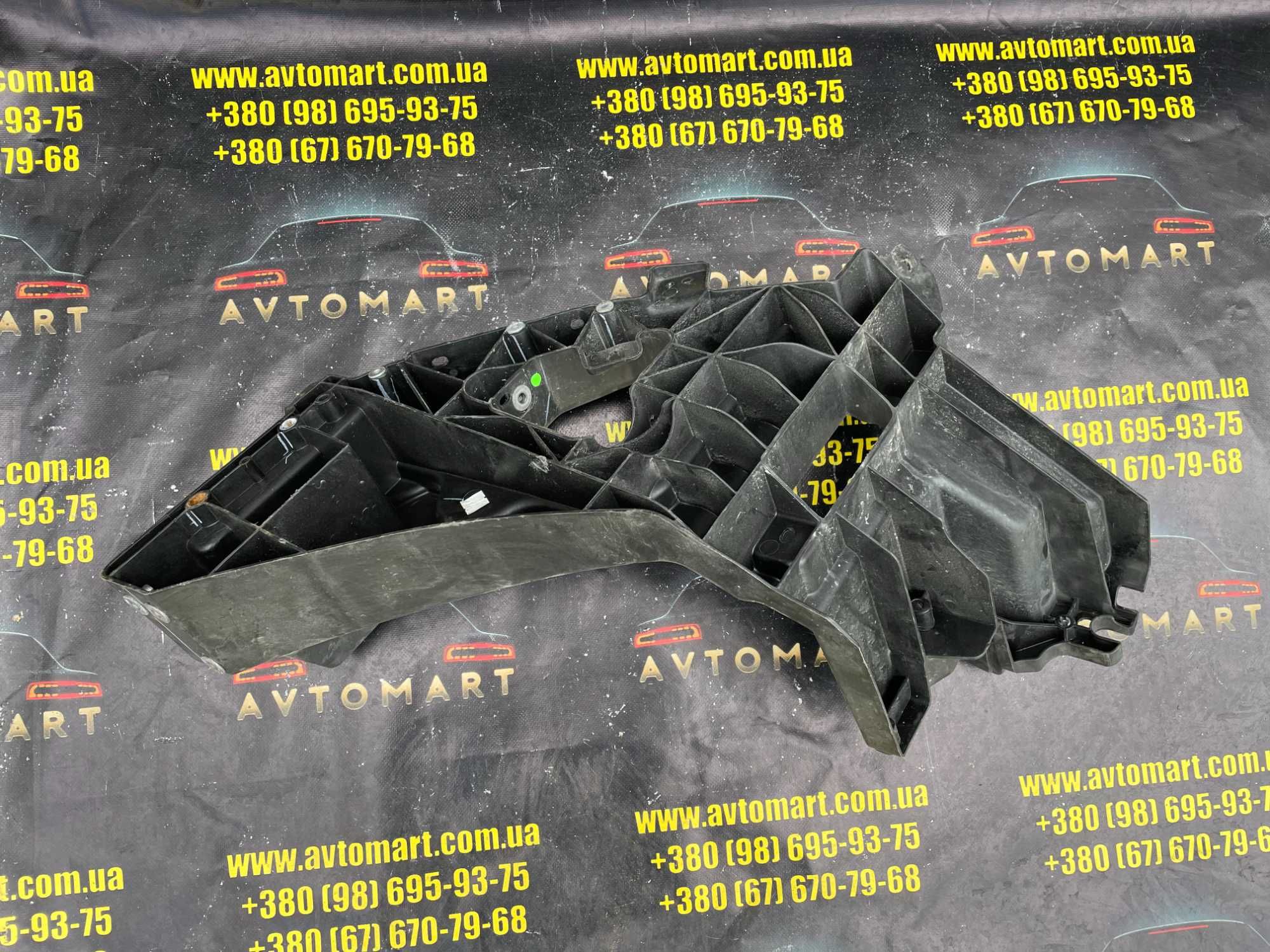 Кронштейн фары левый шахта Tesla mx 1043357-00-F Кронштейн фари