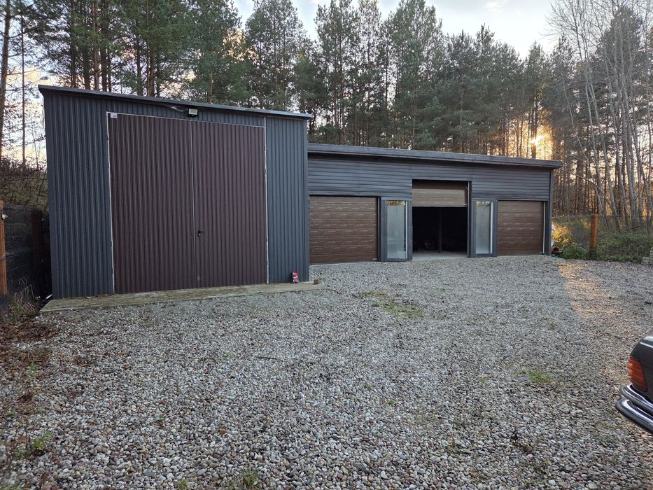 Garaże garaż  małe hale hala na konstrukcji drewnianej i pokryte blach