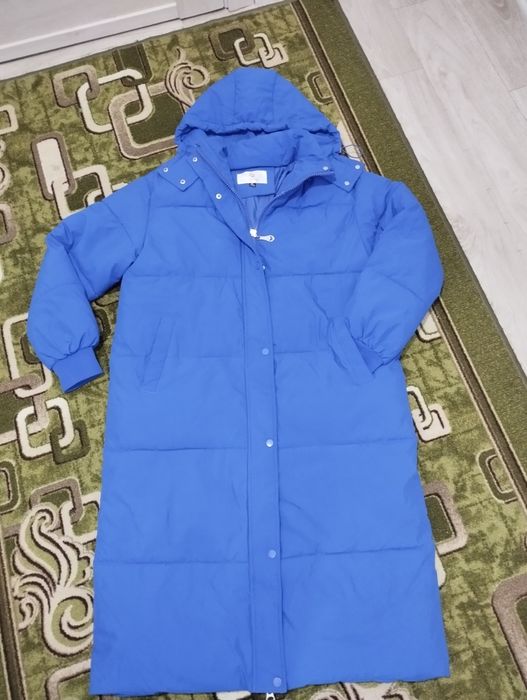 Довгий  пуховик.