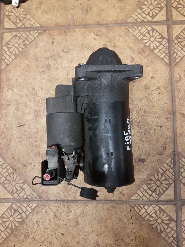 Rozrusznik Fiat Stilo 1.9JTD  00011  09030