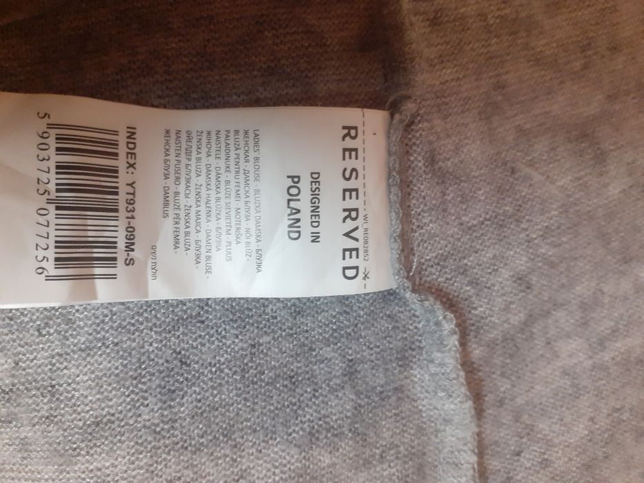 Atrakcyjny sweterek  Marki Reserved