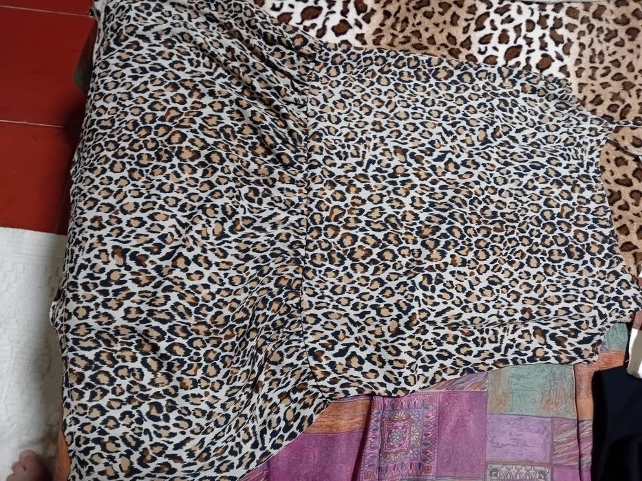 Túnica bege e castanho