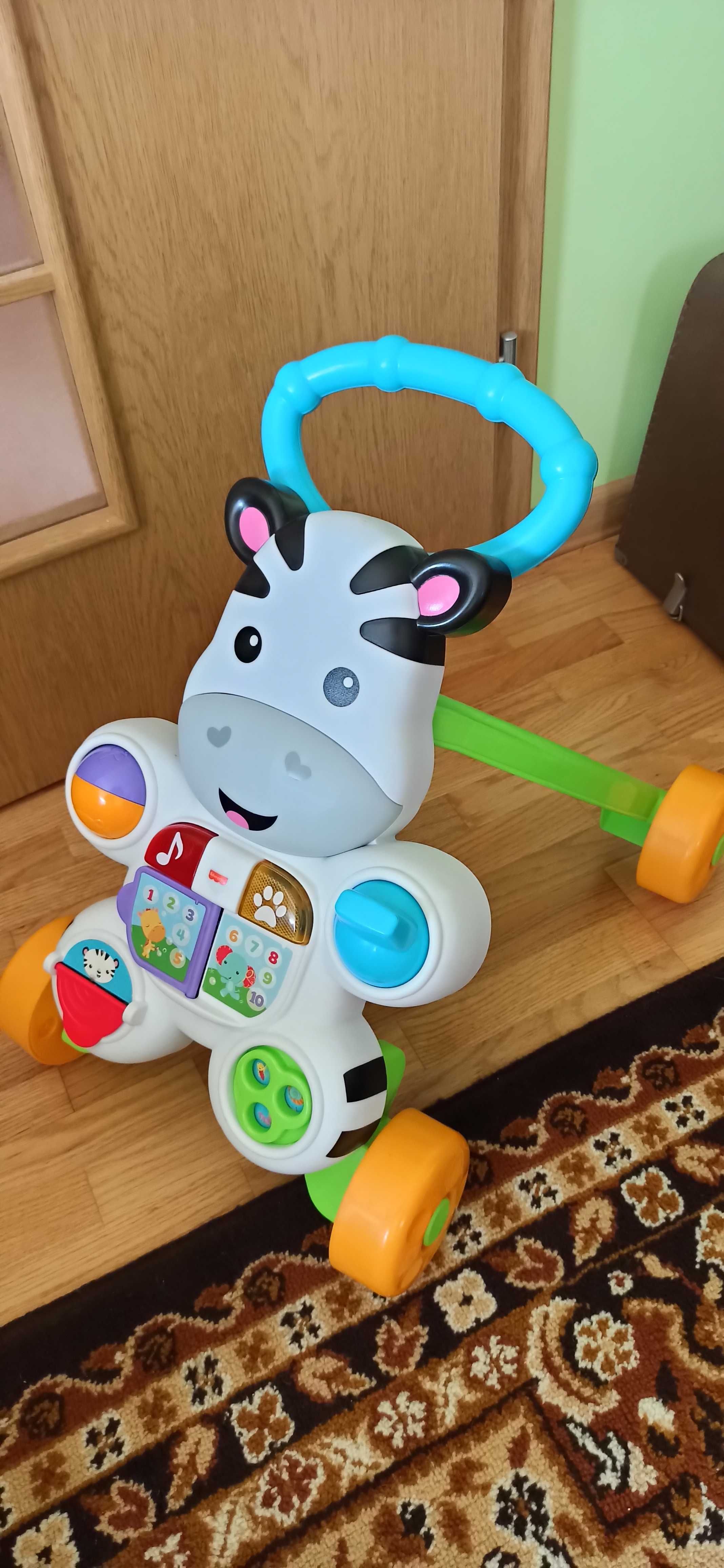 Fisher-Price interaktywny chodzik pchacz jeździk zebra