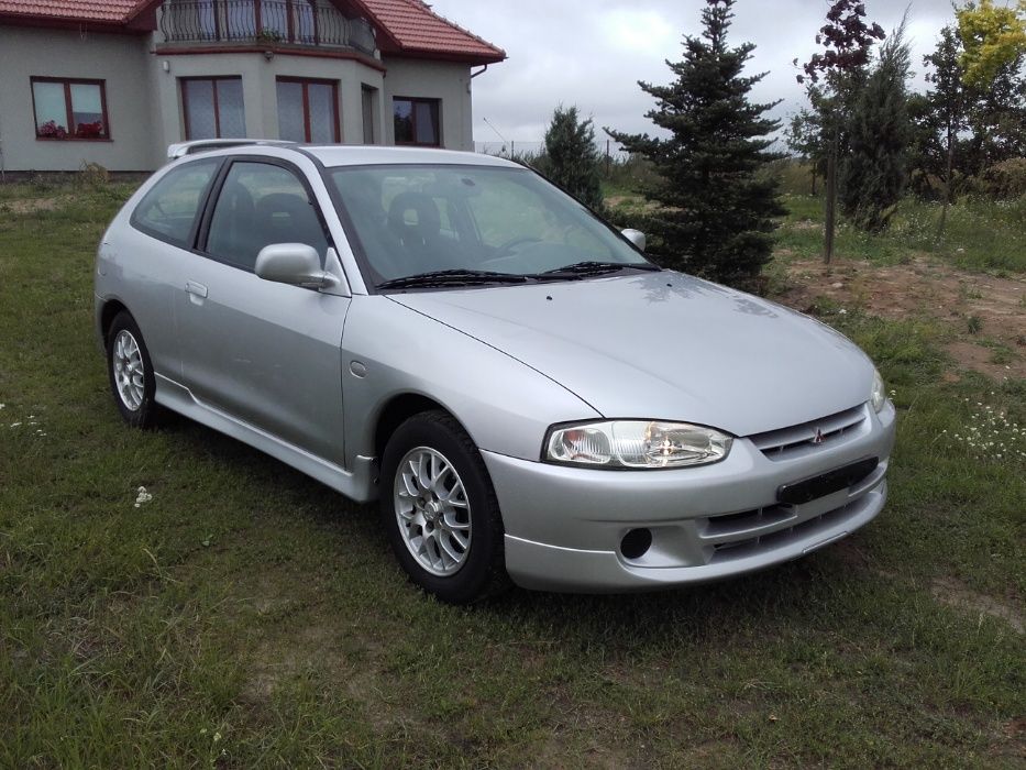 Drzwi prawe lewe Mitsubishi Colt V 5 Cjo Cj0 95-03r A69 Srebrne