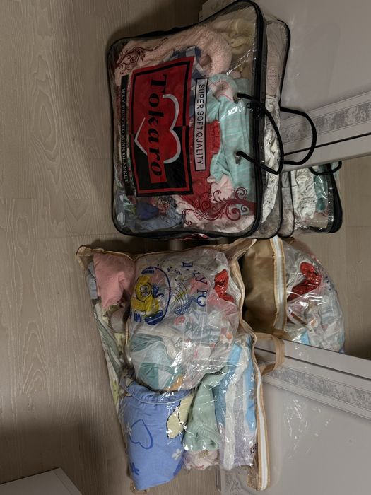 Отдам несколько пакетов детских вещей