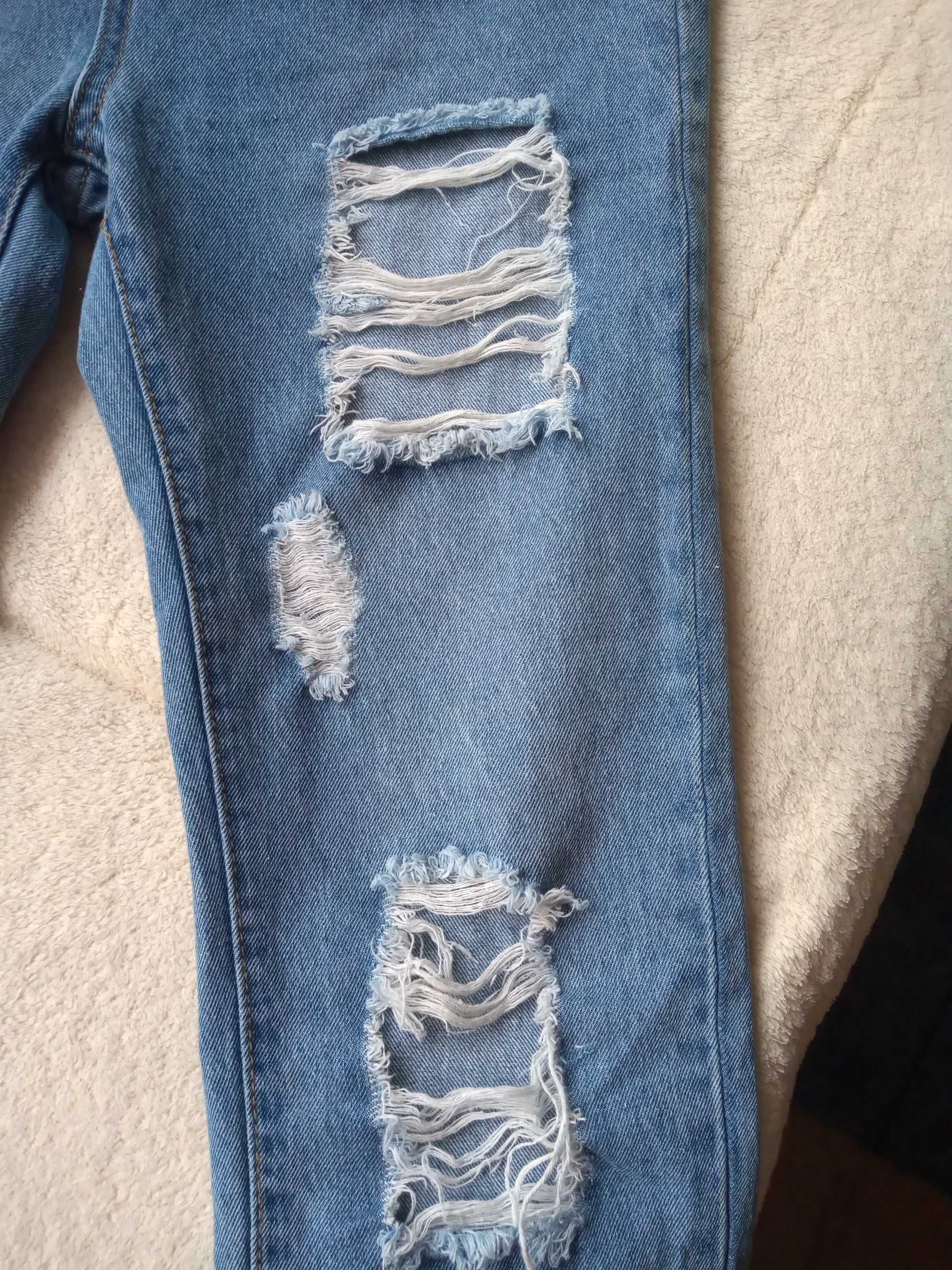 Spodnie jeansy rozdarcia