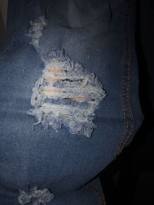 Modne Spodnie jeans dziury r.9 fashionova