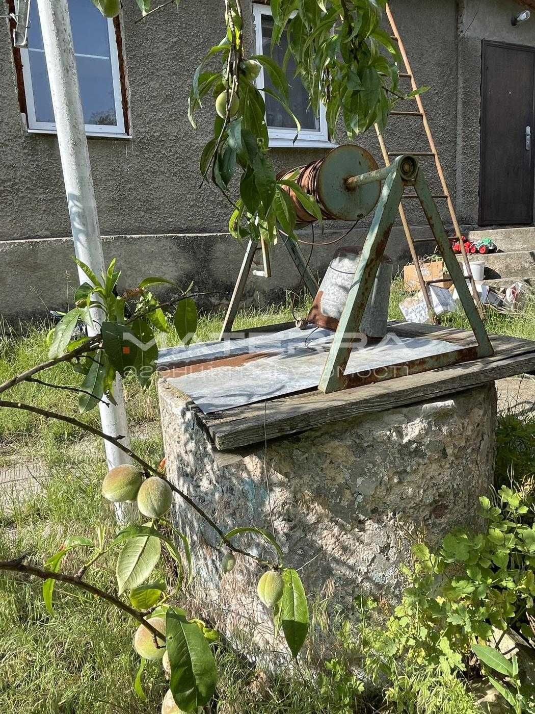 Малютянка продам пів будинку 57 м2 з виходом у ліс та своїм озером