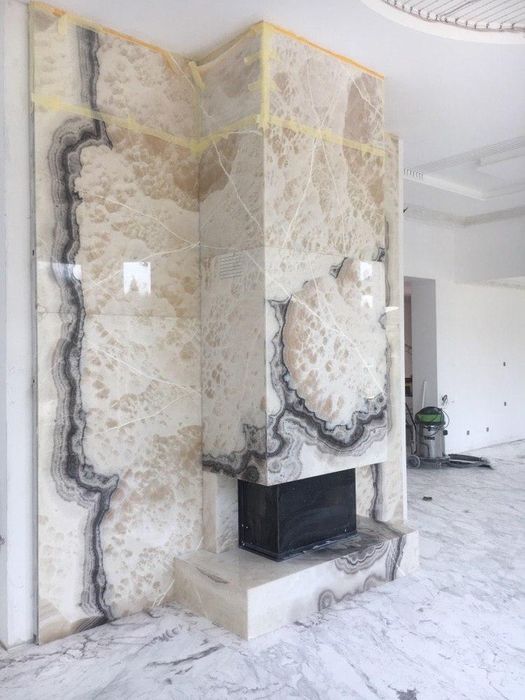 Каміни, оздоблення каменем, камінні полички, камінні портали