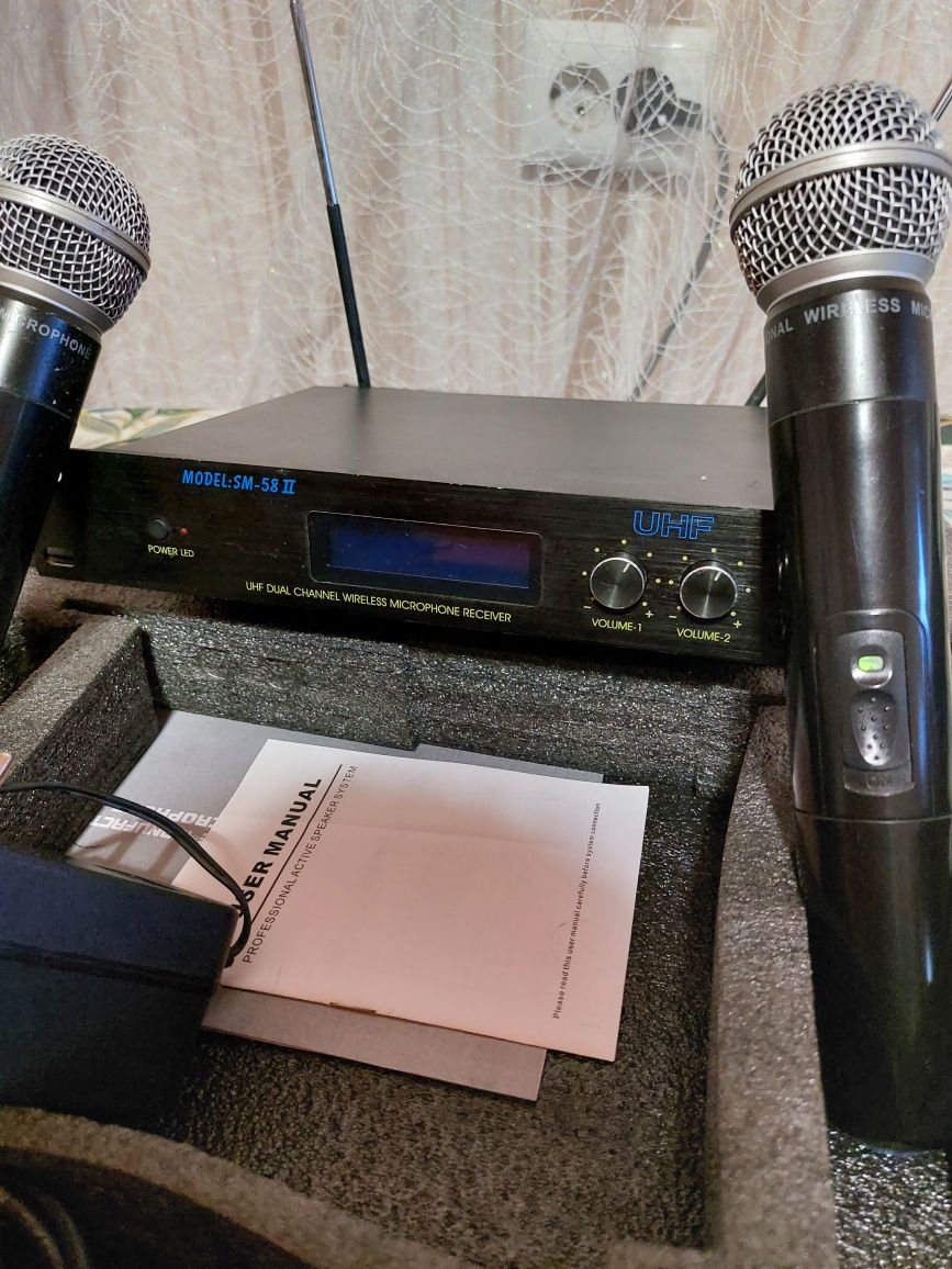 Микрофоны беспроводные 2шт
Радіосистема SHURE SM58