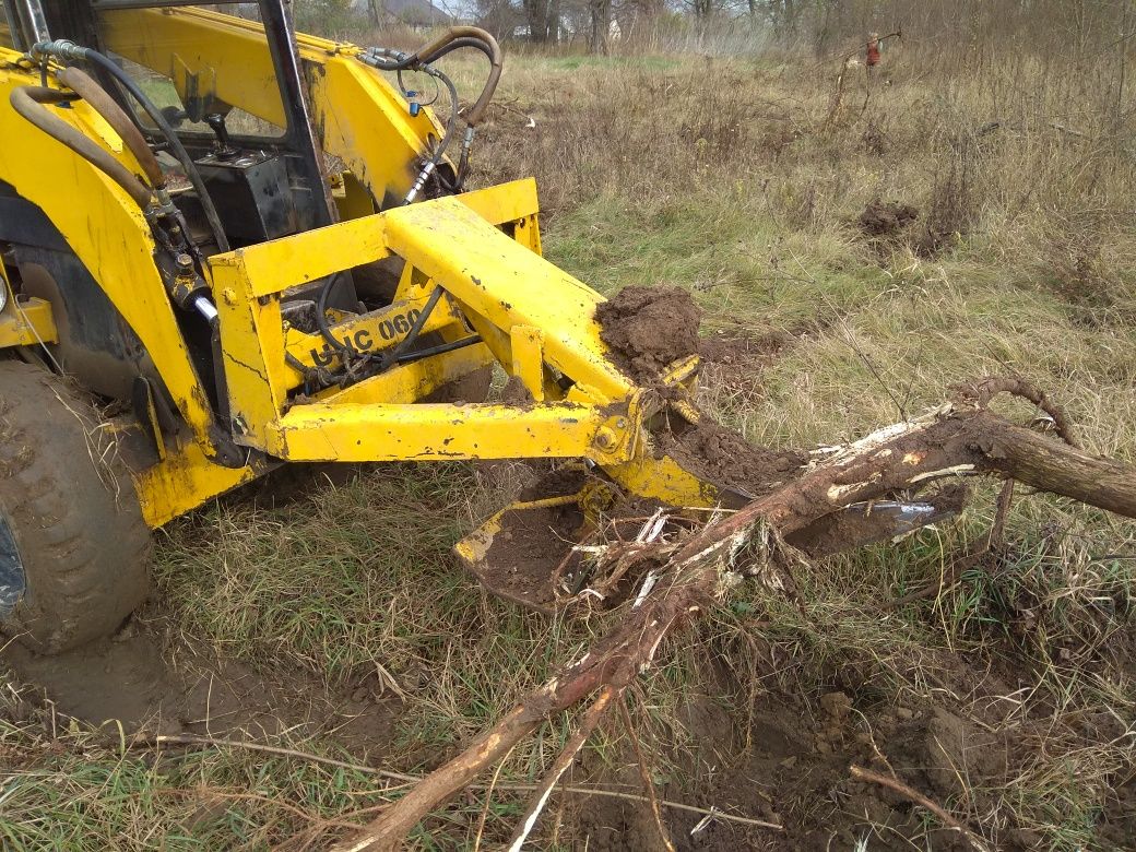 UNC 060 bobcat Корчувач пнів, Корчуватіль, корчування дерев