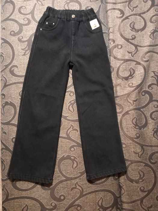 Утеплені чорні джинси на дівчинку