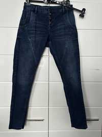 Dżinsowe spodnie rurki rozmiar 30