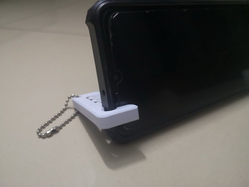 Suporte para telemovel pequeno e pratico