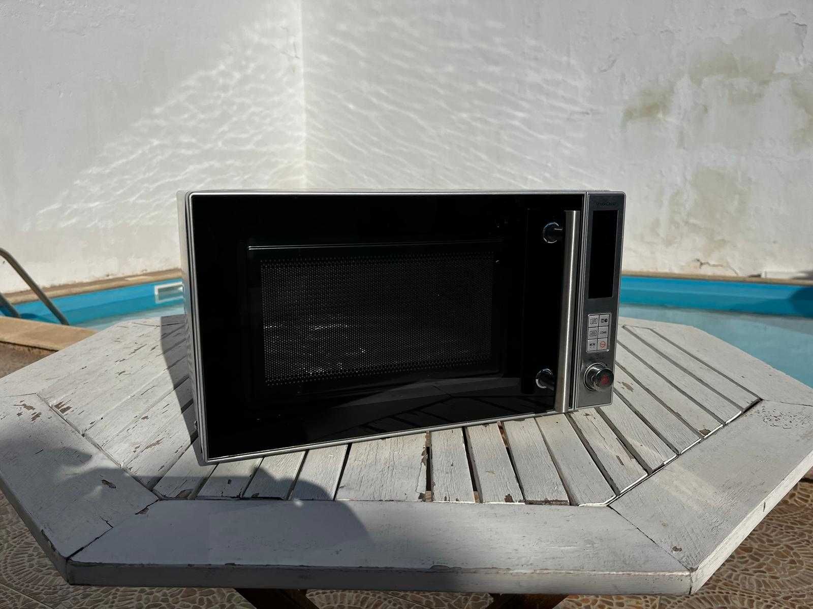 Vendo microondas em perfeito estado de funcionamento.