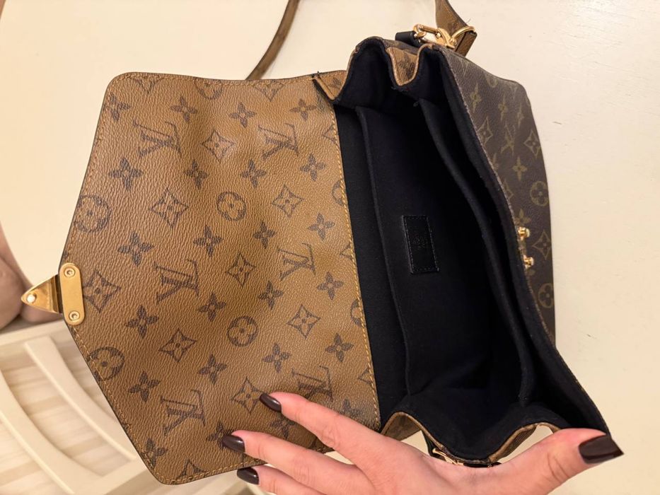 Сумка шкіряна в лого в ідеальному стані