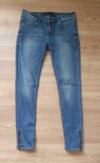 Damskie spodnie jeans r. 42 suwaki XL