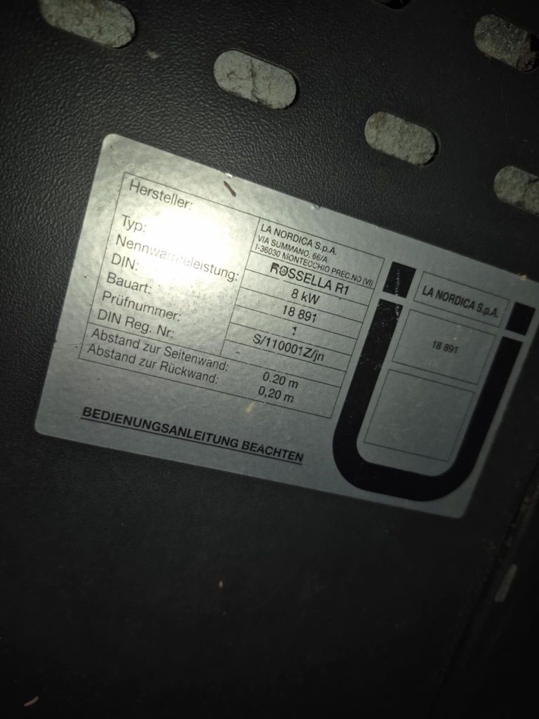 Kominek, piec żeliwny na drewno z kamieniem