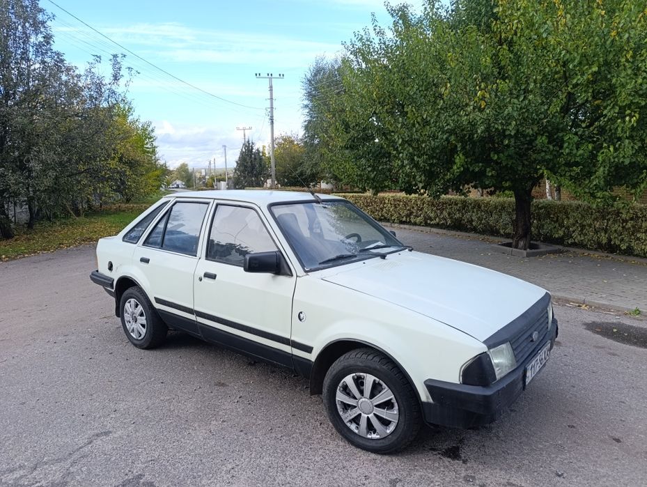 Форд эскорт газ/бензин