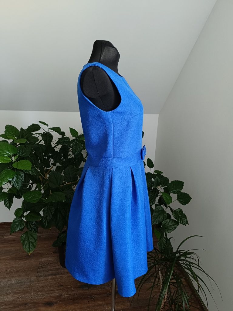 śliczna niebieska rozkloszowana sukienka L 40 zamek na plecach