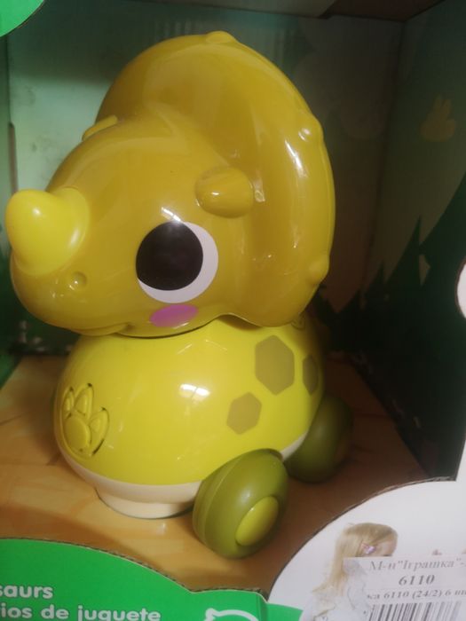 Каталка-динозаврик електронна Hola Toys музична 18х12 см з підсвічуван