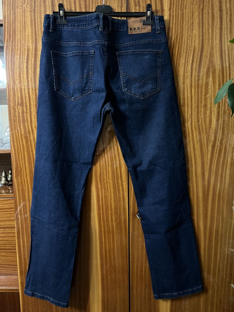 NOWE Spodnie jeansowe męskie L/XL