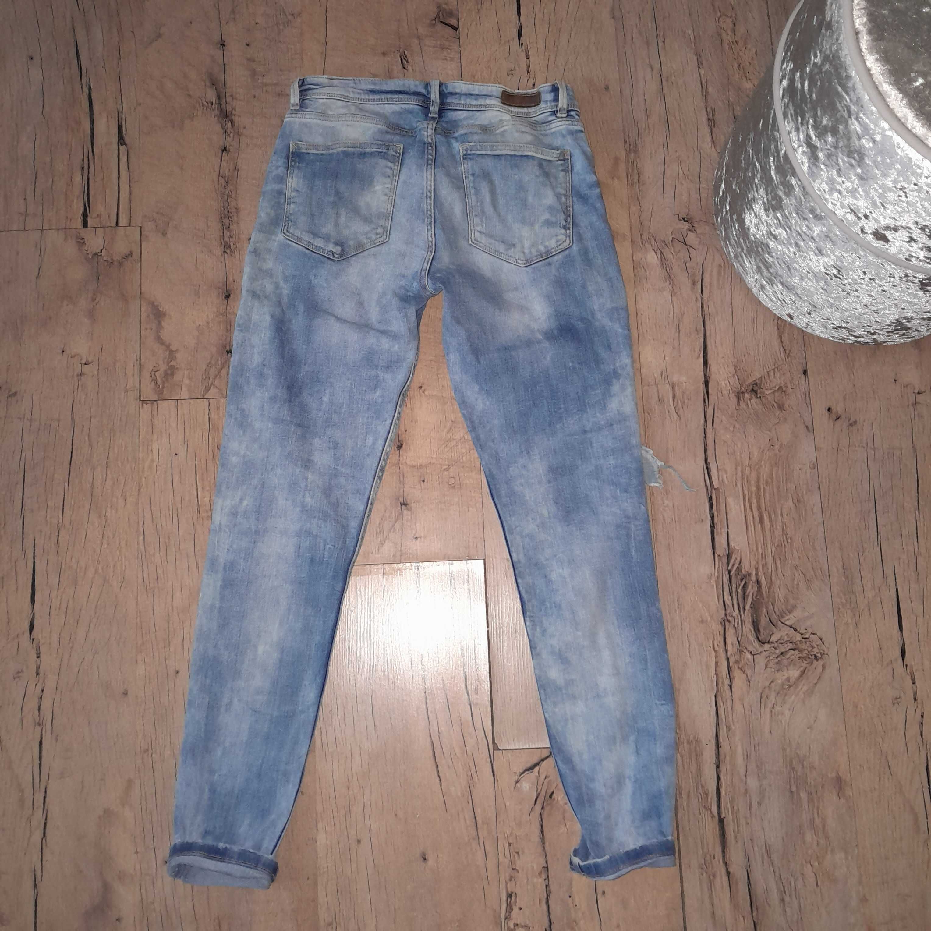 Spodnie jeansowe Zara 38 M S dziury biodrowki rurki