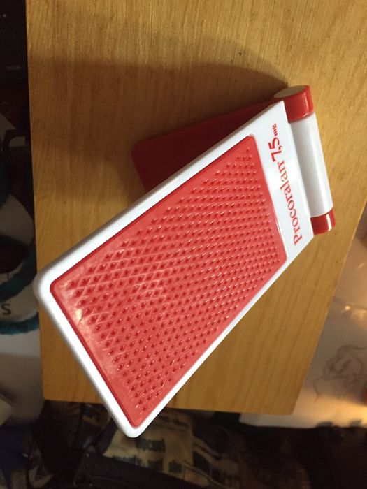 Acessório telemóvel suspensão para ver filmes. Novo. Encartável