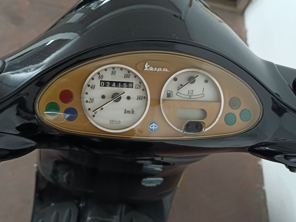 Vendo ou troco Vespa et4 125