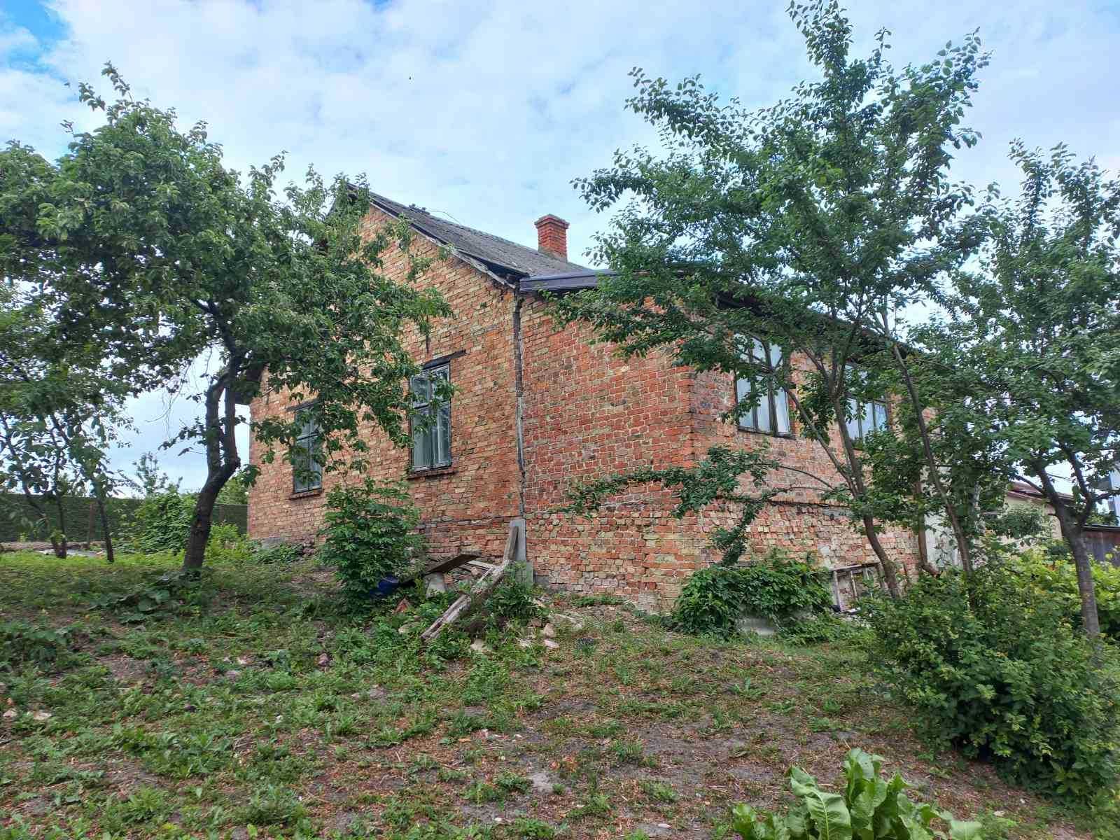 Житловий будинок та земельна ділянка 12 сот., м. Кам'янка-Бузька