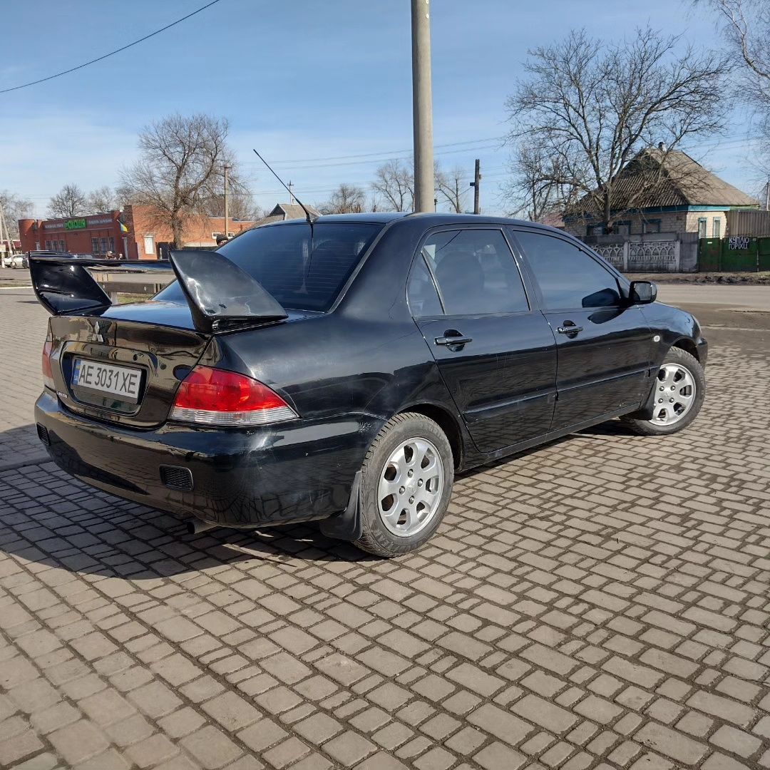 Mitsubishi lancer 1,6 газ кондиціонер підігріви