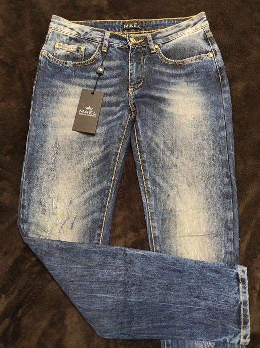 Нові класичні сині джинси розмір М