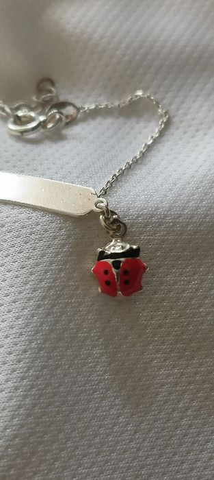 Pulseira criança em prata com chapa e joaninha