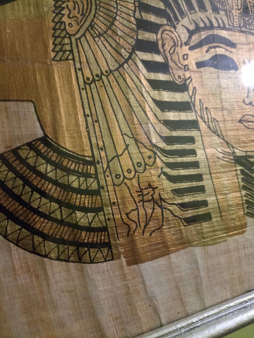 Stary obraz malowany na prawdziwym papirusie w ramie za szkłem.