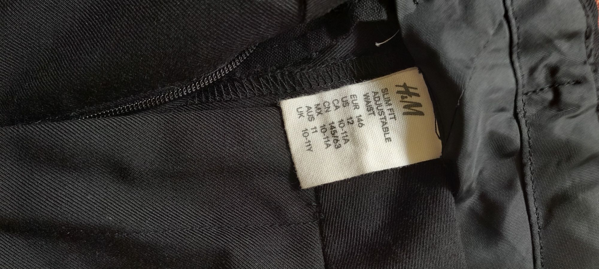 Roupa preta diversa camisa e calças