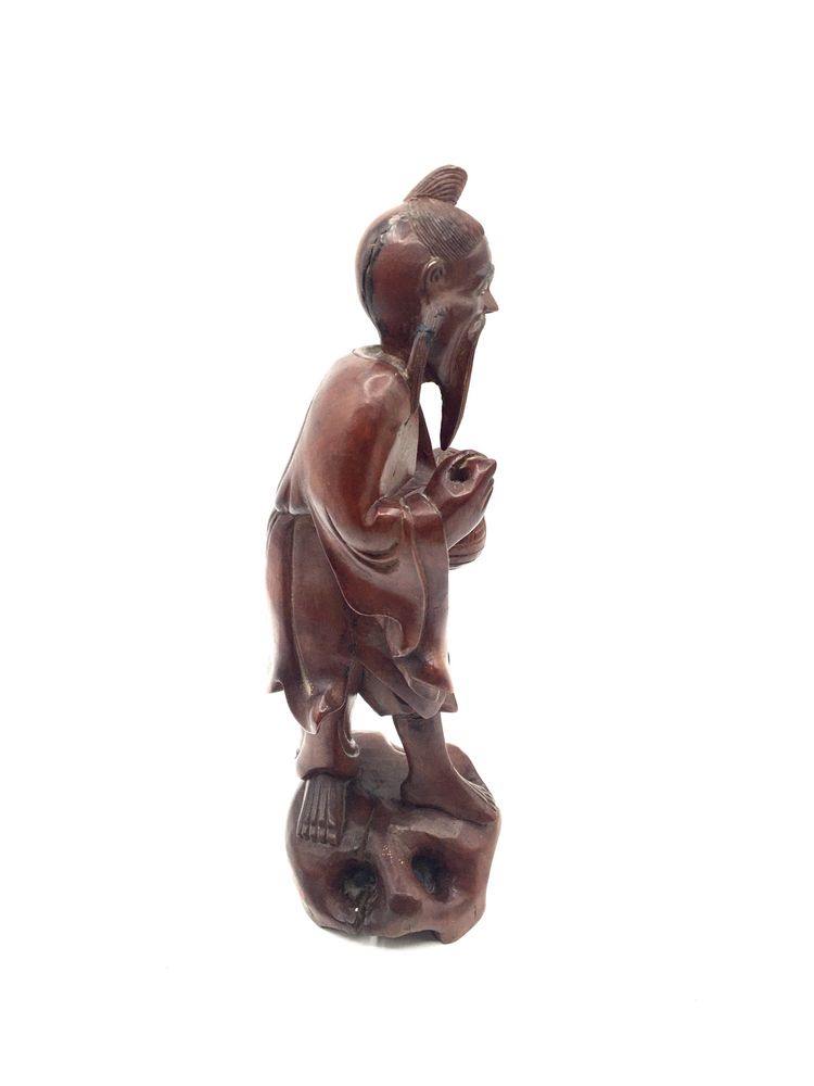 Escultura oriental em madeira zodiaca