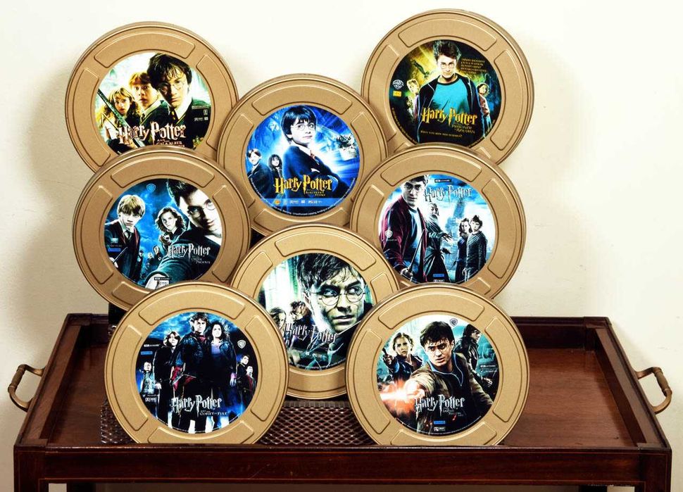 HARRY POTTER Colecção completa 8 filmes da saga em latas promocionais
