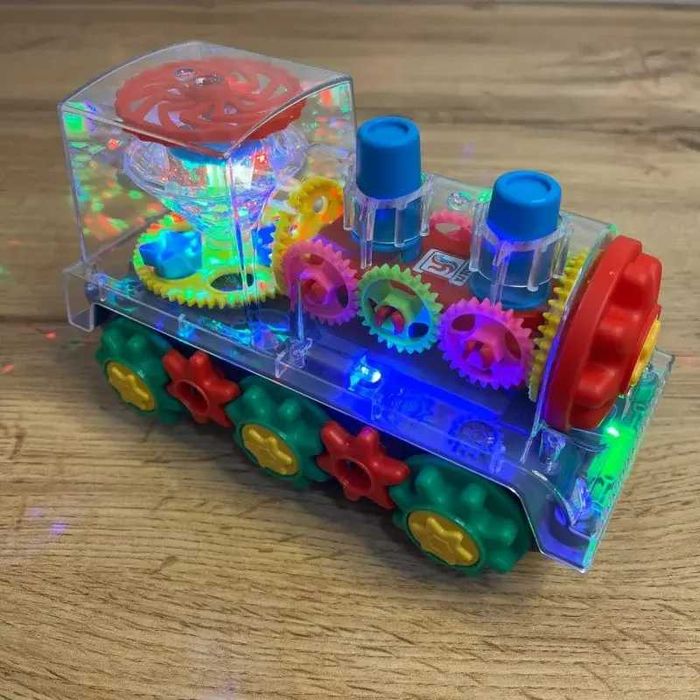 Дитячий інтерактивний прозорий поїзд зі світлом, музикою та поворотом