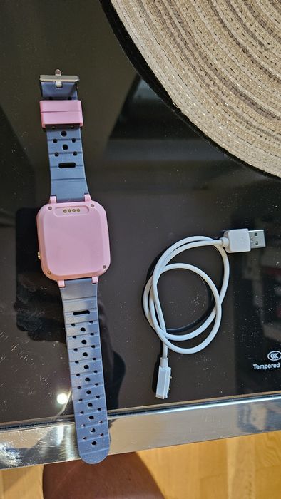 Smartwatch dziecięcy różowy GPS SIM aparat – sprawny