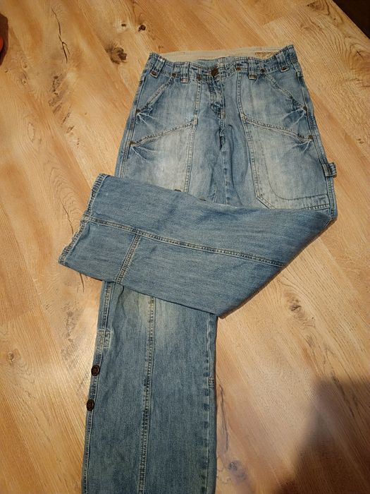 Szerokie jeansy z przetarciami New look