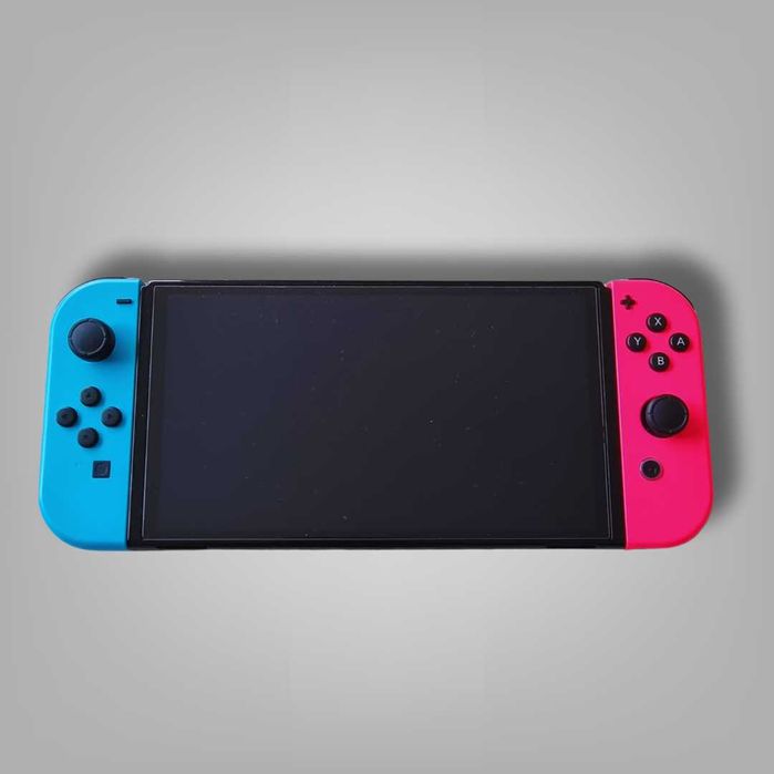 Nintendo Switch OLED + FC25 + 2 joy-cons extra
