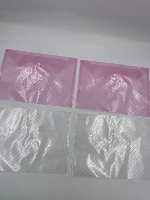 zestaw 10 kolorowych plastikowych teczek a4 z zatrzaskiem