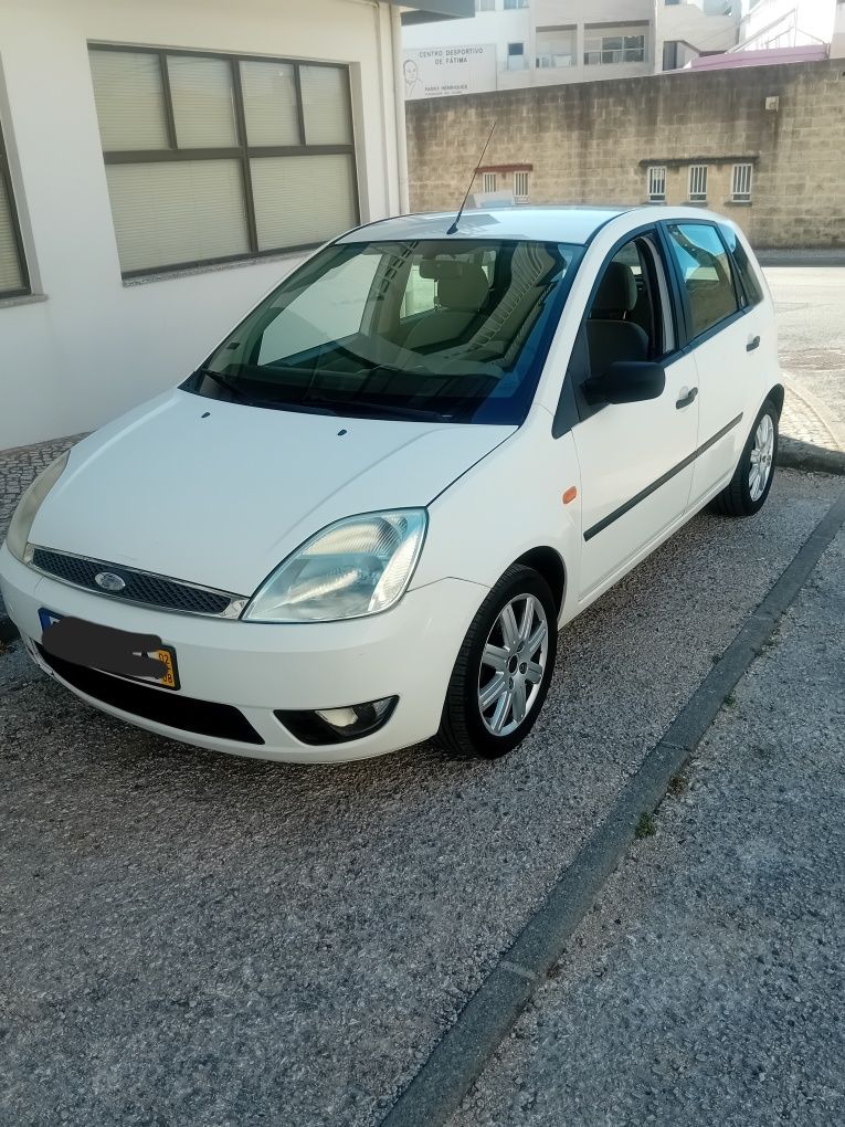 Vendo ford fiesta 1.4 16v gasolina ano 2002