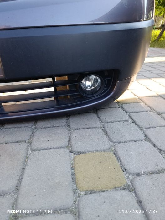 Передній бампер. Renault Scenic 2. (Дорест.)