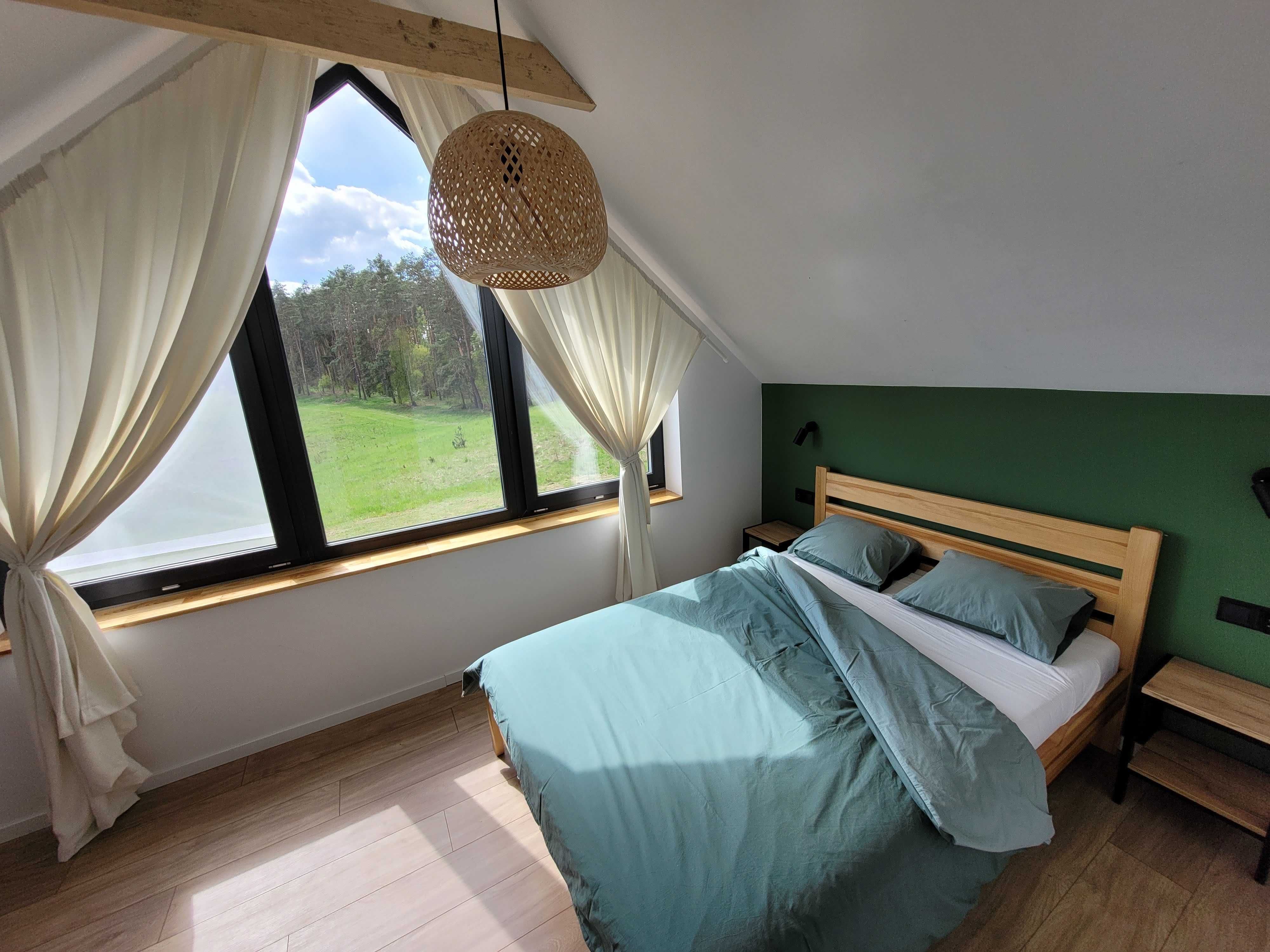 Domki Ryn Mikołajki Mazury jezioro i las