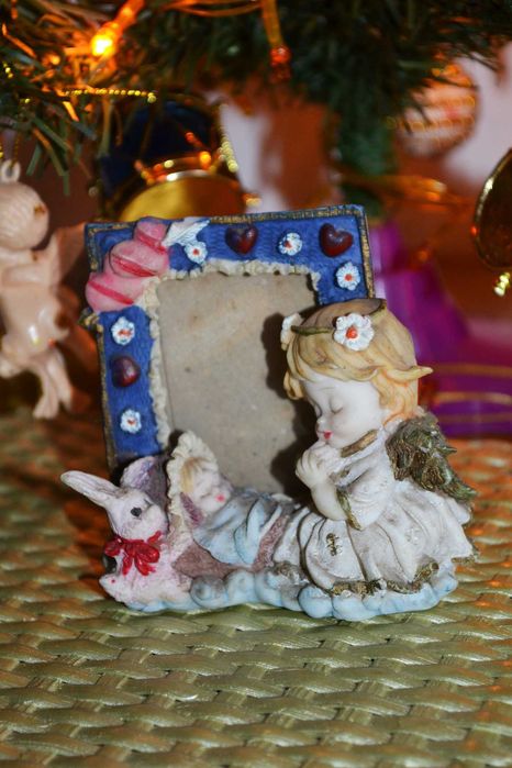 Рамка для фото малыш ребенок в колыбели люльке и ангел молится