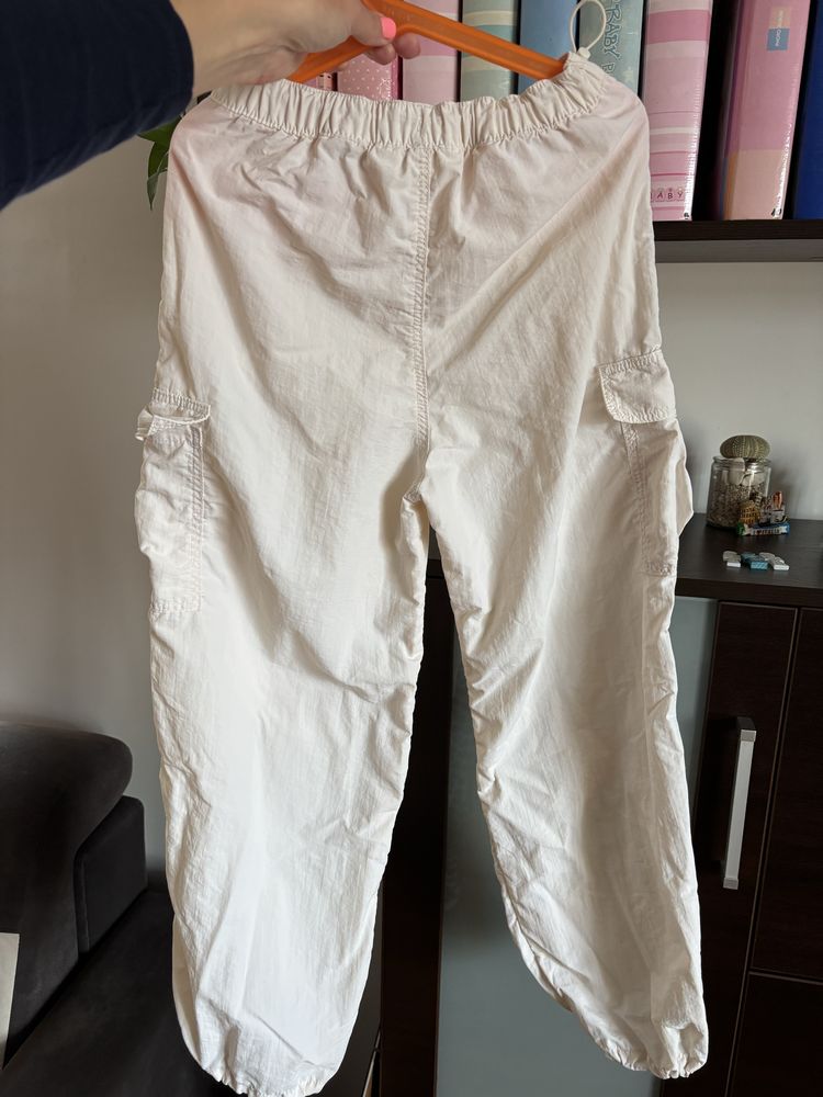 Spodnie kremowe H&M