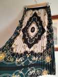 Saia plissada senhora, S